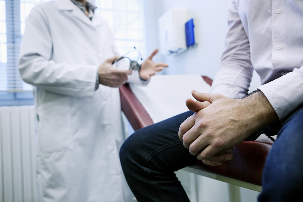 man at doctor's appointment