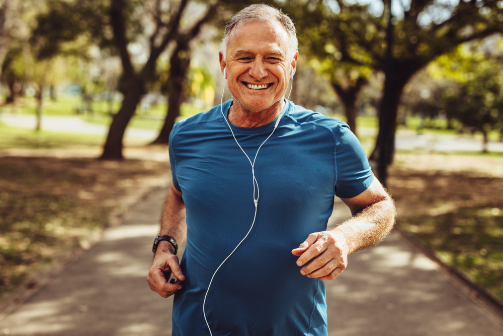 older man running outdoors