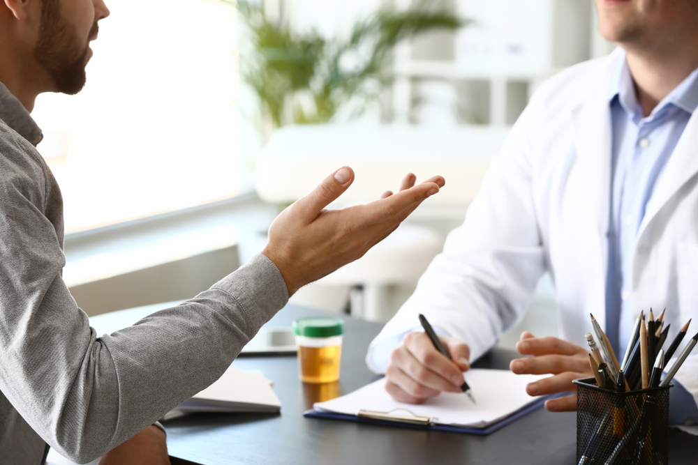 Male patient at urologist's office.